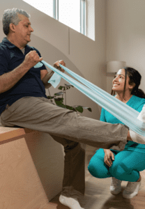 Kinesiologist working with patient on strength training